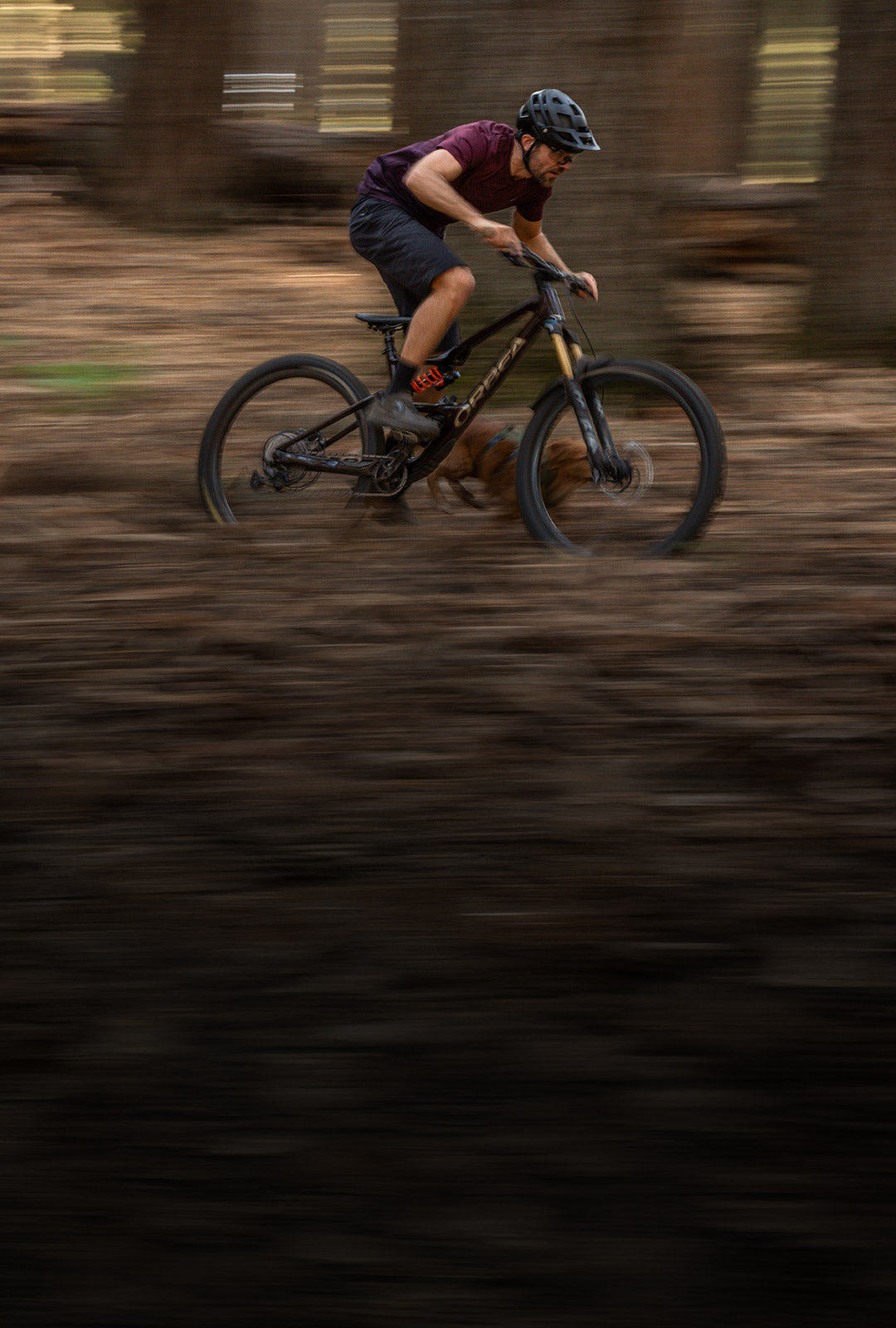 Fruitsnackzach and maisey riding full speed in mtb downhill. Maisey wears the Muse harness in Trail Green.